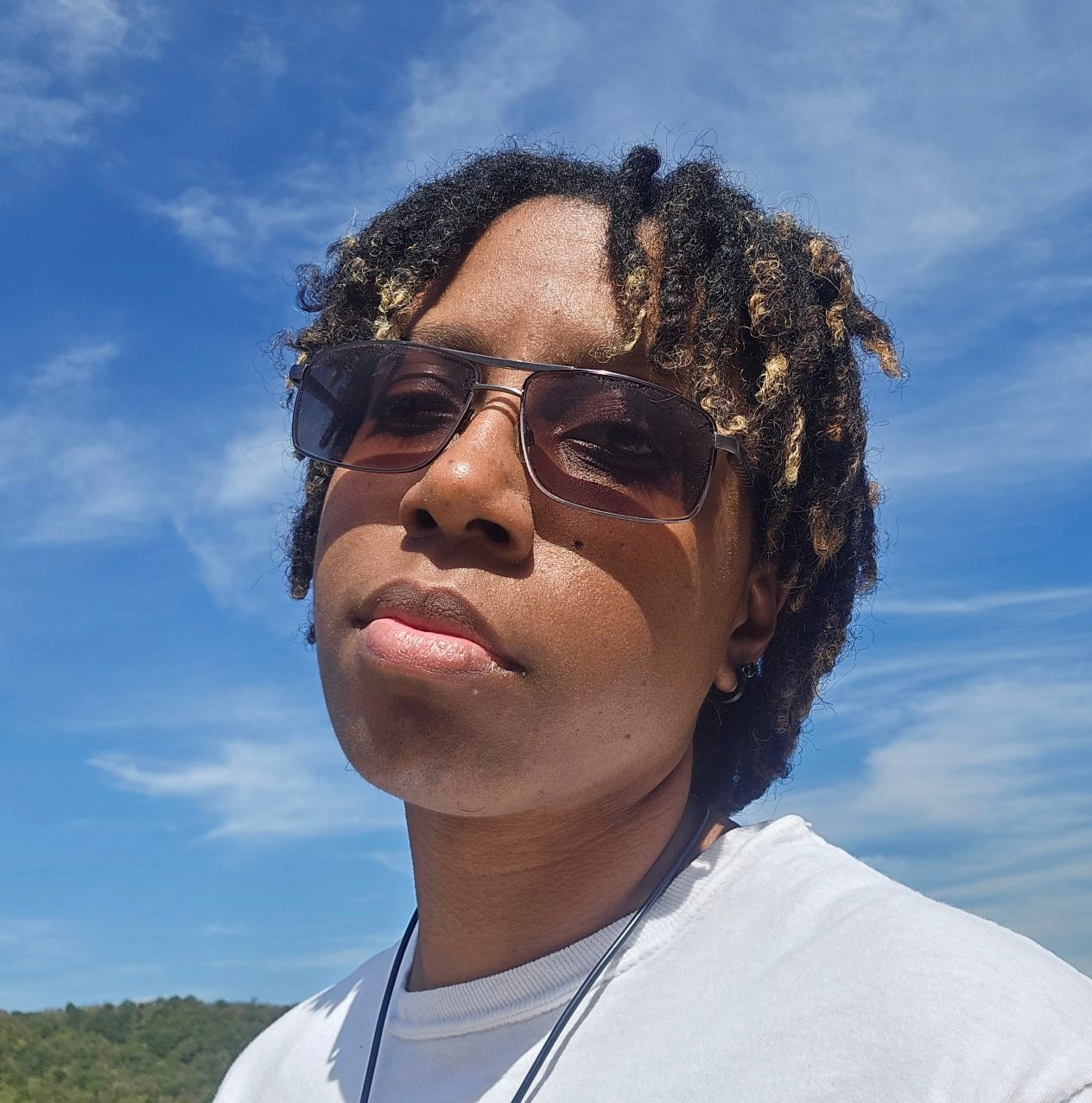 Melody Evans, Graphic Manager, Champion Media